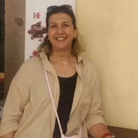 İŞİMİ YAPARKEN  Muazzez Toğrul