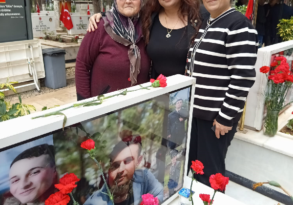 ŞEHİT AİLLERİNE DOKUNUŞ